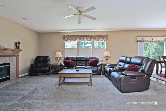 2467 W Autumn Dr, Round Lake, IL 60073 - carpeted living area with healthy amount of natural light, a ceiling fan, and a high end fireplace