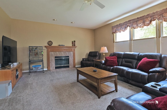 2467 W Autumn Dr, Round Lake, IL 60073 - living room with light carpet, a tiled fireplace, and ceiling fan