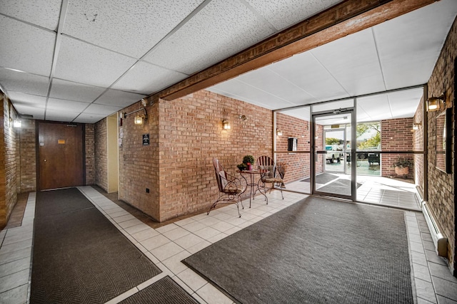 10210 Washington Ave Unit 311, Oak Lawn, IL 60453 - community lobby with brick wall and a drop ceiling