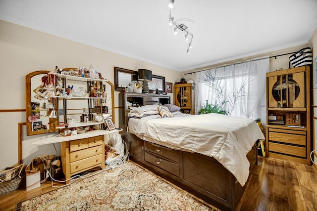 10210 Washington Ave Unit 311, Oak Lawn, IL 60453 - bedroom with crown molding and wood finished floors