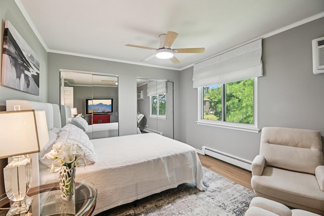 9S240 Lake Dr Unit 17-207B, Willowbrook, IL 60527 - bedroom with a baseboard heating unit, wood finished floors, multiple windows, crown molding, and ceiling fan