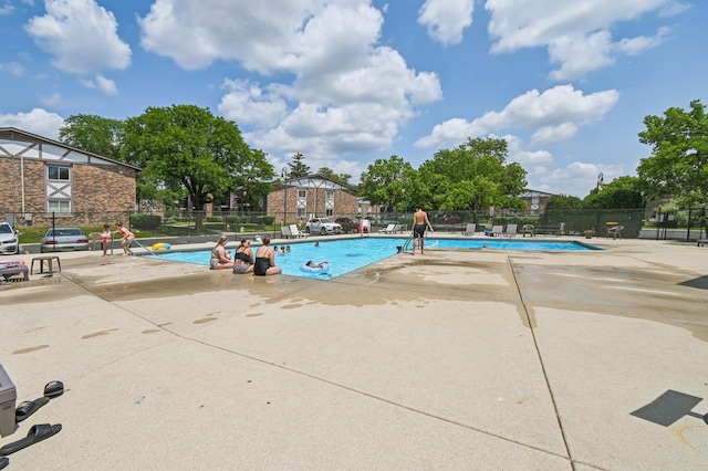 9S240 Lake Dr Unit 17-207B, Willowbrook, IL 60527 - community pool with a patio area