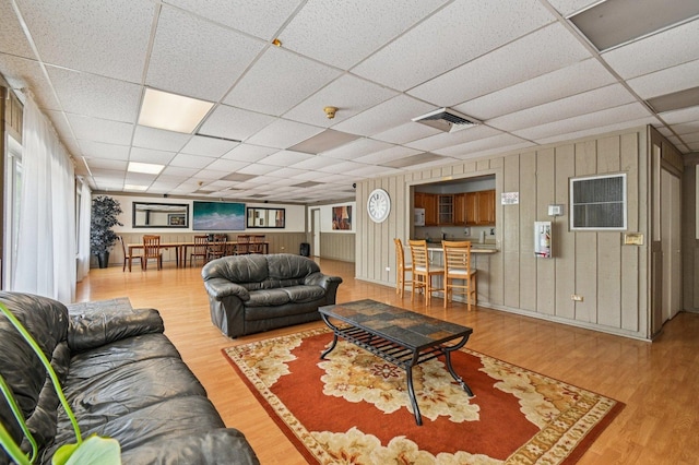 9S240 Lake Dr Unit 17-207B, Willowbrook, IL 60527 - living room featuring wood finished floors and a paneled ceiling