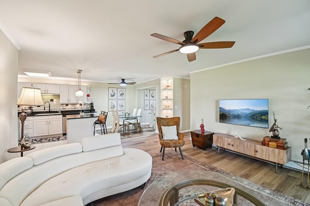 9S240 Lake Dr Unit 17-207B, Willowbrook, IL 60527 - living room with light wood-style flooring, crown molding, and ceiling fan