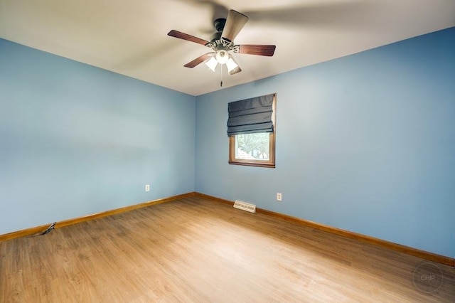 24460 Easy St, Plainfield, IL 60586 - empty room with ceiling fan and light wood-style floors
