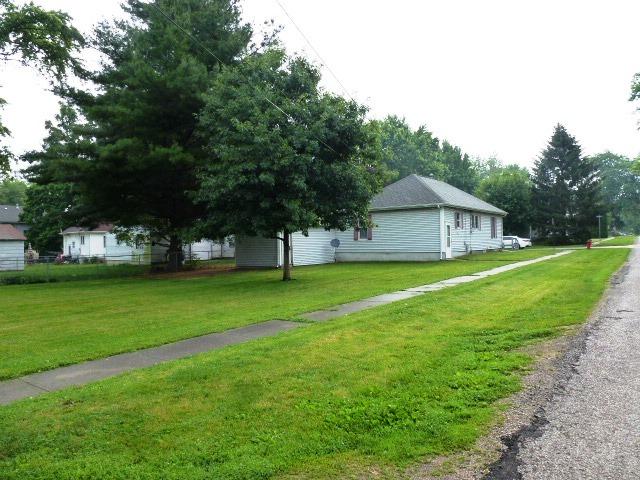 503 N Linden St, Clinton, IL 61727 - view of property exterior with a yard