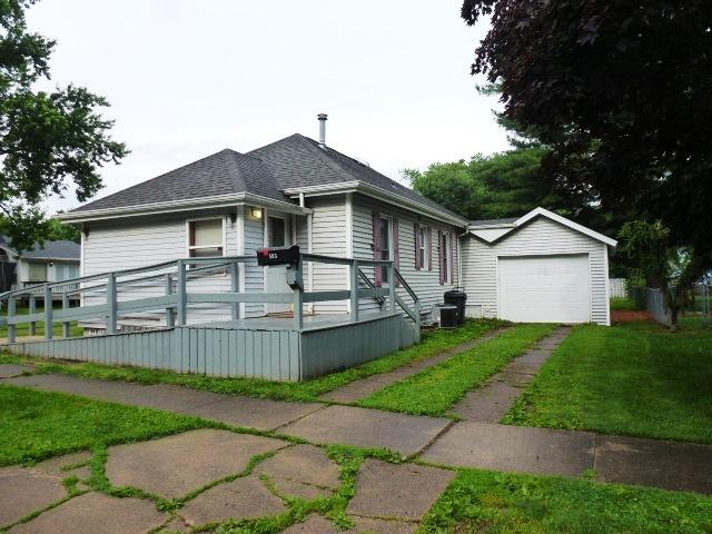 503 N Linden St, Clinton, IL 61727 - view of front of house featuring a wooden deck, a shingled roof, and driveway