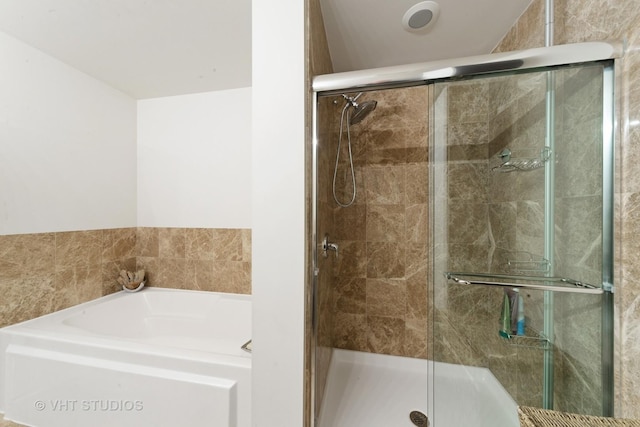 740 W Fulton St Unit 1202, Chicago, IL 60661 - full bathroom featuring a bath and a shower stall