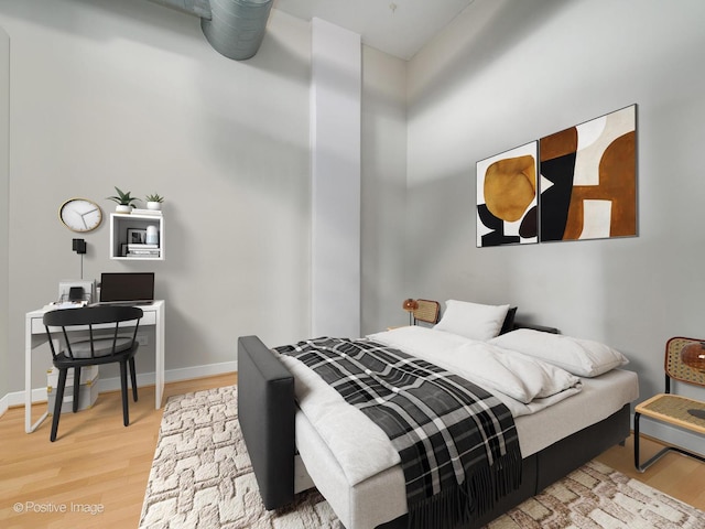 740 W Fulton St Unit 1202, Chicago, IL 60661 - bedroom featuring wood finished floors and an office area