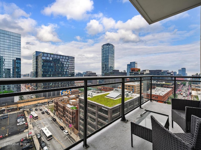 740 W Fulton St Unit 1202, Chicago, IL 60661 - balcony featuring a city view