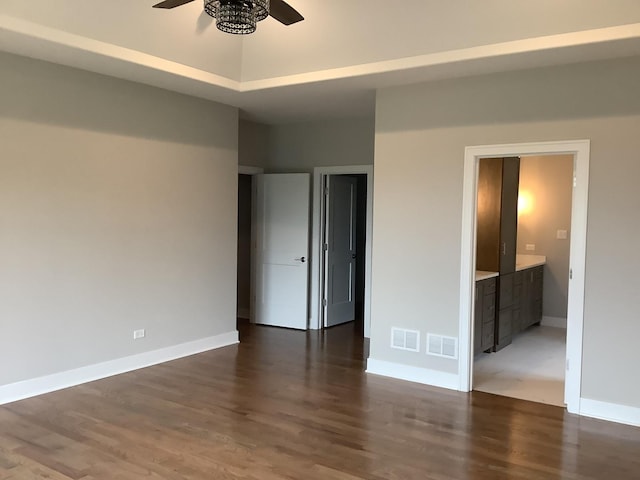 12415 Foxborough Dr, Mokena, IL 60448 - unfurnished bedroom with dark wood-type flooring