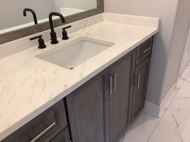 12415 Foxborough Dr, Mokena, IL 60448 - bathroom with marble look tile flooring and vanity