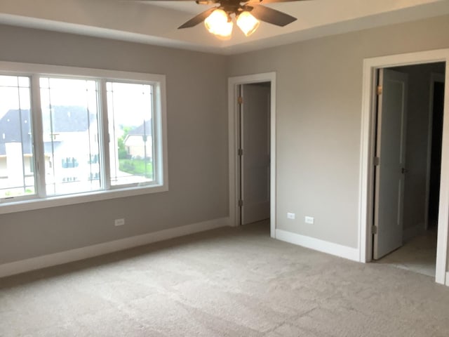 12415 Foxborough Dr, Mokena, IL 60448 - unfurnished bedroom with light carpet, multiple windows, and ensuite bath