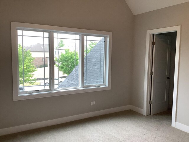 12415 Foxborough Dr, Mokena, IL 60448 - empty room featuring plenty of natural light, light colored carpet, and vaulted ceiling