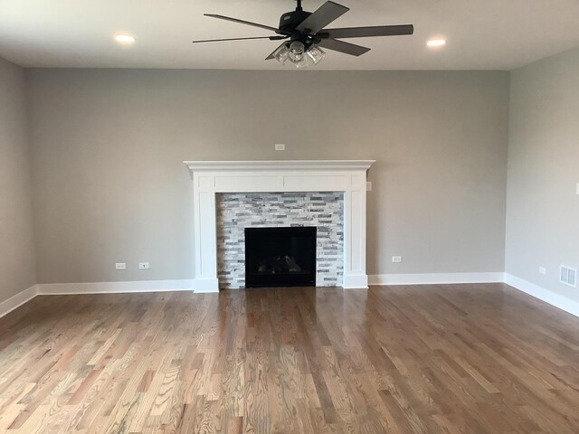 12415 Foxborough Dr, Mokena, IL 60448 - unfurnished living room with ceiling fan, wood finished floors, a fireplace, and recessed lighting