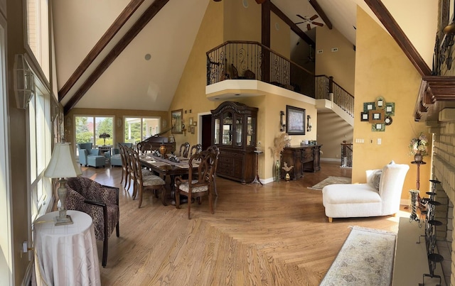 10652 Lexington Ct, Frankfort, IL 60423 - living area with high vaulted ceiling, stairway, a ceiling fan, and light wood-type flooring