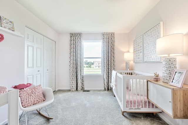 1759 Breton Ave, North Aurora, IL 60542 - bedroom with carpet, a nursery area, and a closet