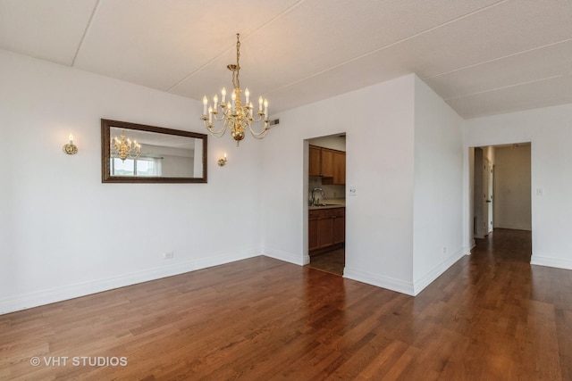 12900 W Heiden Cir Unit 4304, Lake Bluff, IL 60044 - empty room featuring a chandelier and dark wood-style floors