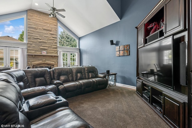 24650 Lincolnway St, Plainfield, IL 60544 - living area featuring high vaulted ceiling, ceiling fan, dark colored carpet, and a fireplace