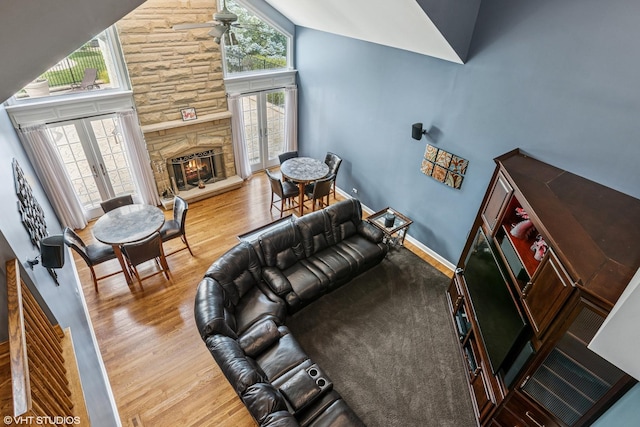 24650 Lincolnway St, Plainfield, IL 60544 - living area with wood finished floors, a fireplace, french doors, and high vaulted ceiling