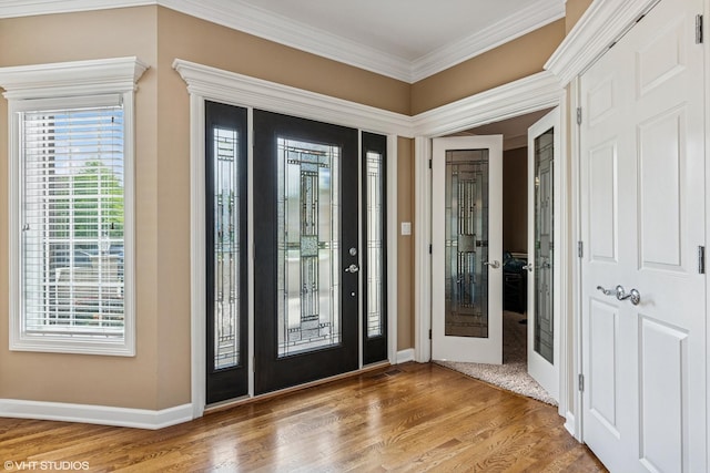 24650 Lincolnway St, Plainfield, IL 60544 - foyer entrance with wood finished floors and crown molding