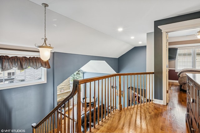 24650 Lincolnway St, Plainfield, IL 60544 - hallway with an upstairs landing, wood finished floors, vaulted ceiling, and recessed lighting