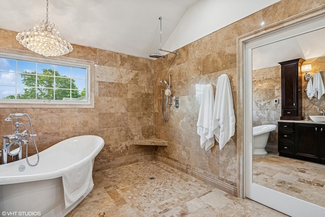 24650 Lincolnway St, Plainfield, IL 60544 - full bathroom with tile walls, vanity, tiled shower, and a freestanding tub