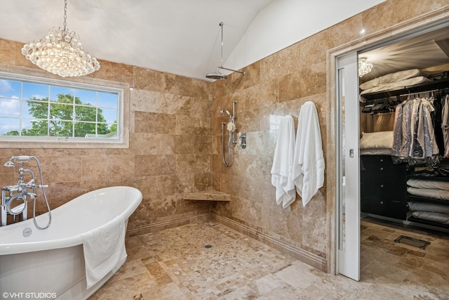 24650 Lincolnway St, Plainfield, IL 60544 - full bathroom featuring tile walls, a soaking tub, a tile shower, vaulted ceiling, and a chandelier