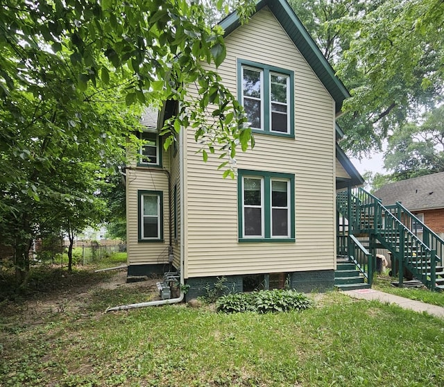 2217 Latham St, Rockford, IL 61103 - back of property with stairs and a yard