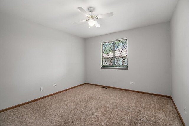 895 Shagbark Rd Unit 44C, New Lenox, IL 60451 - empty room with carpet and a ceiling fan