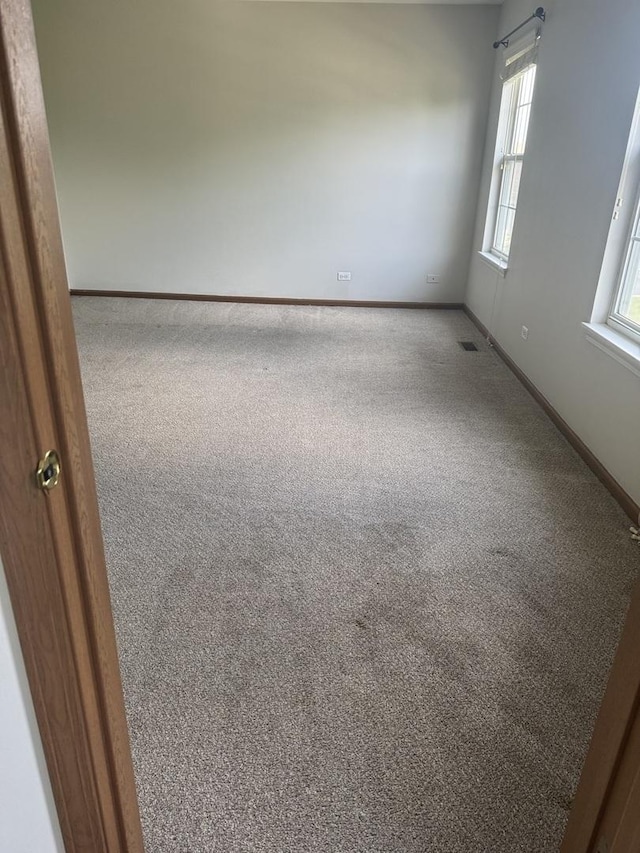 2830 Alameda Ct, Naperville, IL 60564 - carpeted empty room featuring baseboards
