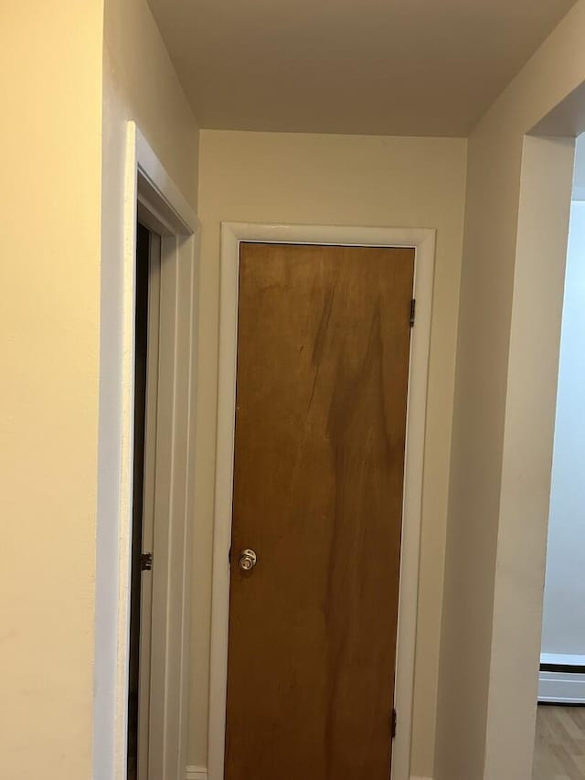 214 S Oak Park Ave Unit 2, Oak Park, IL 60302 - hall with a baseboard heating unit