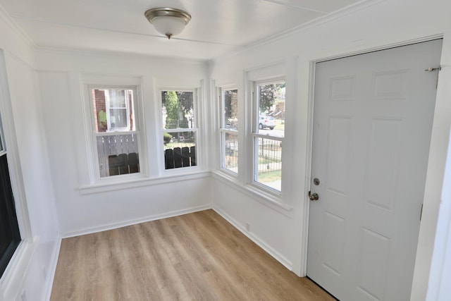 507 Grant Ave, Joliet, IL 60433 - entryway featuring plenty of natural light, light wood finished floors, and crown molding