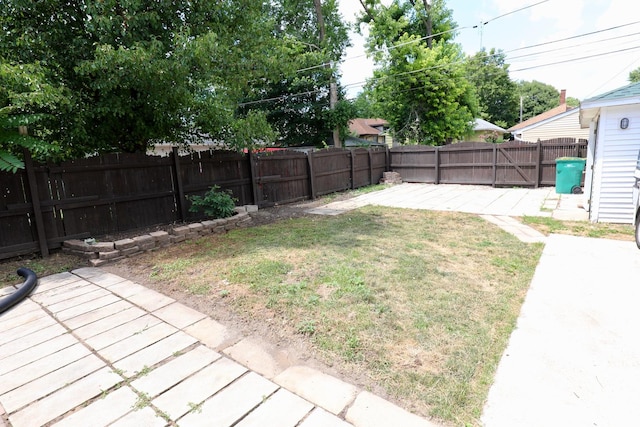 507 Grant Ave, Joliet, IL 60433 - fenced backyard with a patio