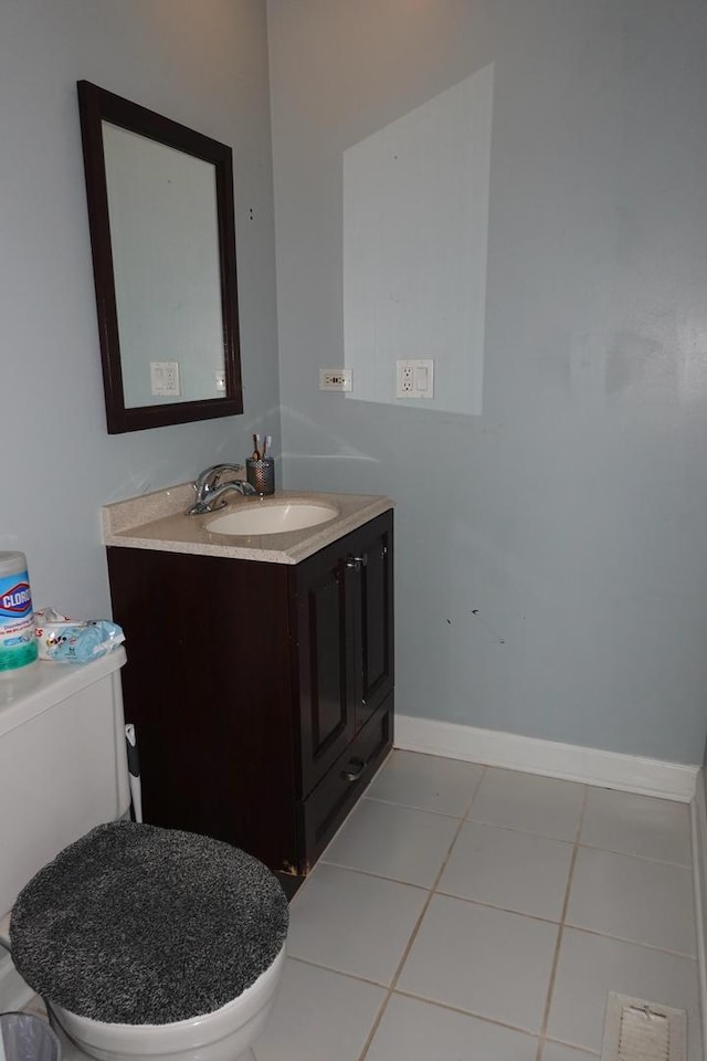 505 Woodmoor Dr, Round Lake Beach, IL 60073 - half bath with vanity and tile patterned floors