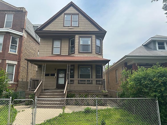4131 N Monticello Ave, Chicago, IL 60618 - view of front of house featuring a porch and a gate