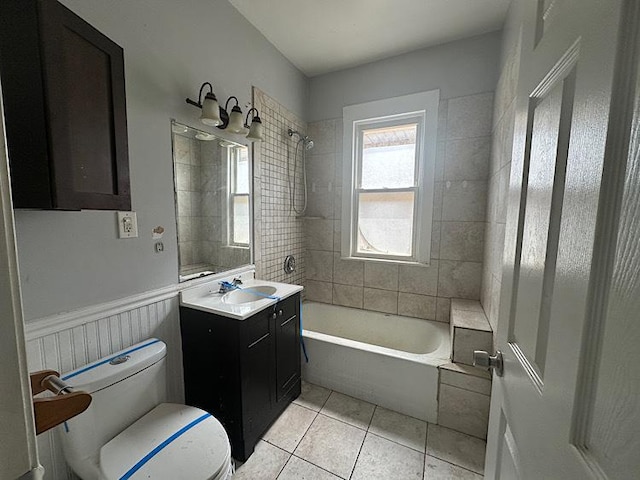 4131 N Monticello Ave, Chicago, IL 60618 - full bathroom with vanity, tile patterned floors, washtub / shower combination, and wainscoting