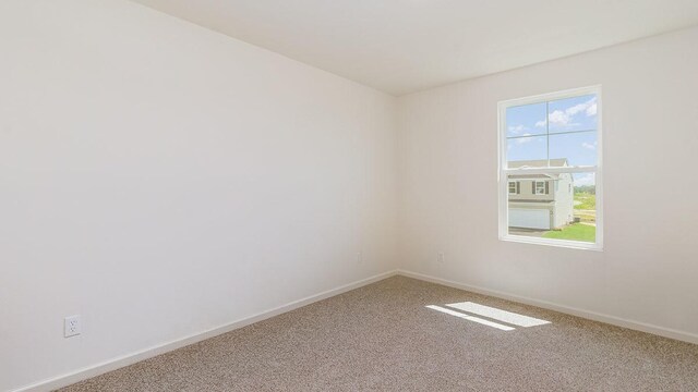 3706 Stockton Dr, Joliet, IL 60436 - spare room with carpet and baseboards