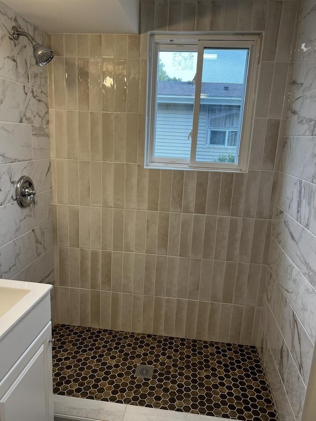 805 Monroe Ave, Carpentersville, IL 60110 - full bathroom featuring a tile shower and vanity