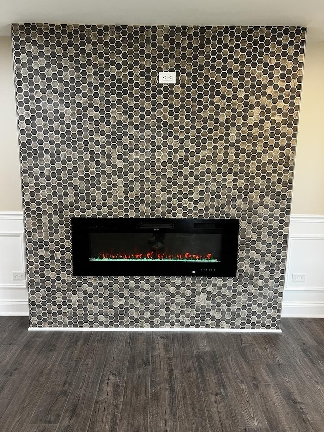 805 Monroe Ave, Carpentersville, IL 60110 - detailed view of a tiled fireplace and wood finished floors