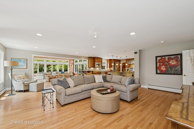 235 Valley Rd, Trout Valley, IL 60013 - living room featuring a baseboard radiator, light wood-style flooring, and recessed lighting