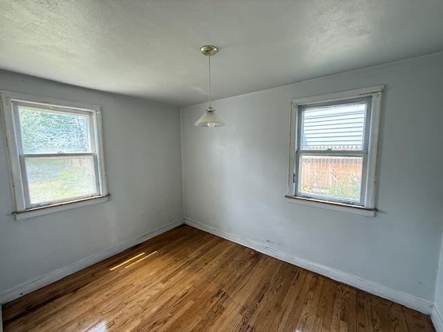 2025 Marshall Pkwy, Waukegan, IL 60085 - unfurnished dining area with wood finished floors and healthy amount of natural light