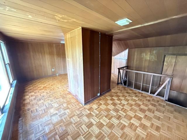 2025 Marshall Pkwy, Waukegan, IL 60085 - additional living space with wood walls and wooden ceiling