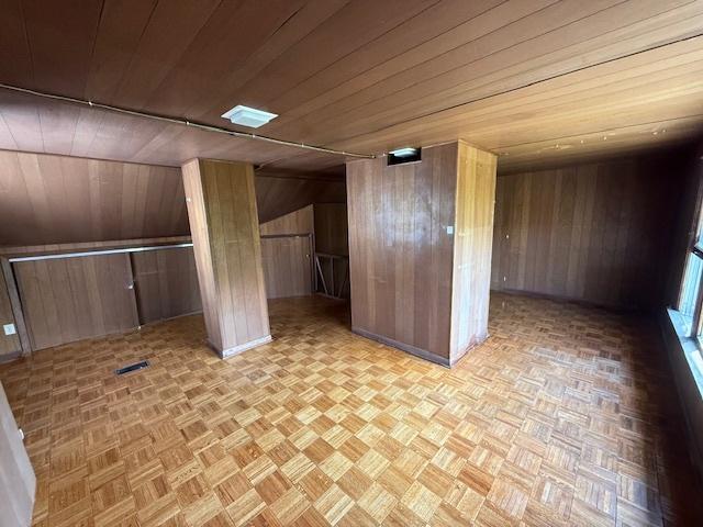 2025 Marshall Pkwy, Waukegan, IL 60085 - unfurnished room with wooden walls and wood ceiling