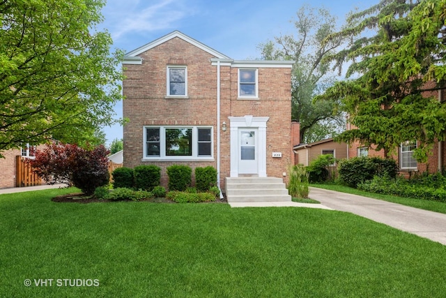 636 S 10th Ave, La Grange, IL 60525 - view of front of property featuring a front lawn and brick siding