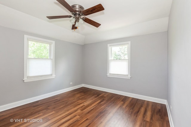 636 S 10th Ave, La Grange, IL 60525 - empty room featuring plenty of natural light, dark wood-style floors, vaulted ceiling, and a ceiling fan
