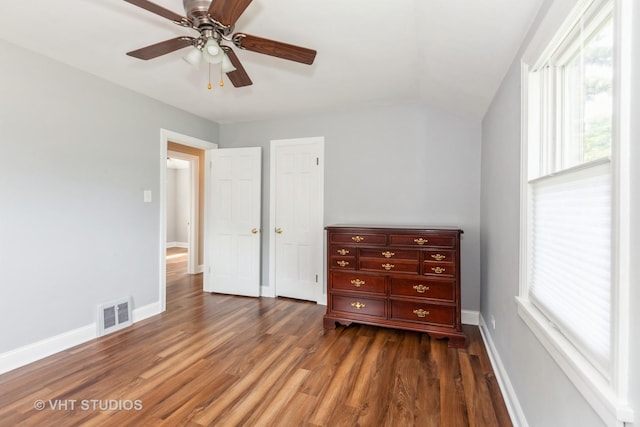 636 S 10th Ave, La Grange, IL 60525 - unfurnished bedroom featuring dark wood-style floors, lofted ceiling, and ceiling fan