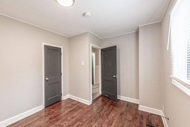 1502 N 34th Ave, Melrose Park, IL 60160 - spare room with a smoke detector, wood finished floors, and crown molding