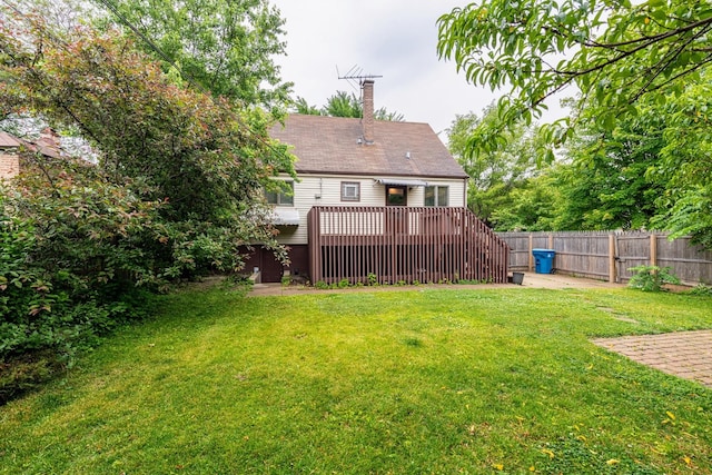 1502 N 34th Ave, Melrose Park, IL 60160 - rear view of property with a fenced backyard, a wooden deck, and a chimney