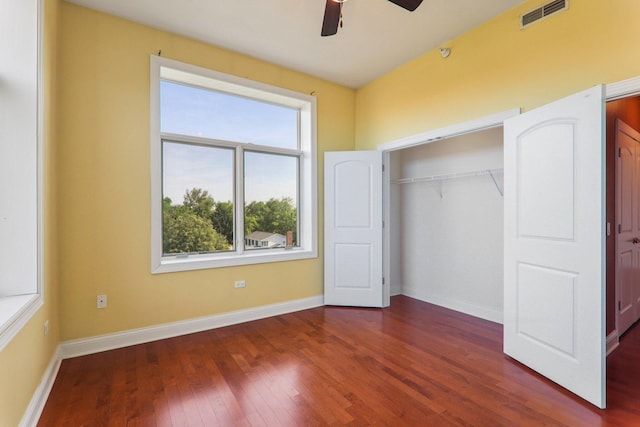 1200 N Foxdale Dr Unit 312, Addison, IL 60101 - unfurnished bedroom featuring wood finished floors, a closet, and a ceiling fan